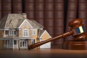 house-with-gavel-and-law-books-real-estate-law-XM3QZCA_resized